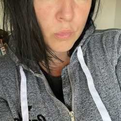 Sonia-Delight-POty-Lips-with-Grey-Hoodie-Up-Close-Face-Shot