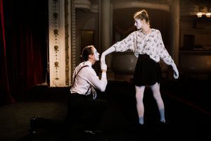 male-mime-artist-kissing-female-mime-s-hand-stage (1)
