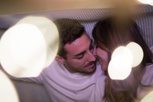 romantic-couple-kissing-blanket