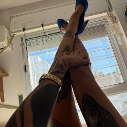 BDSM-Lexy-with-her-Legs-raised-Up-while-Lying-in-Bed